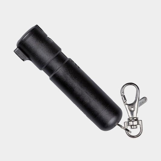 A light gray background product photo of the Sabre Mighty Discreet Pepper Spray Keychain.